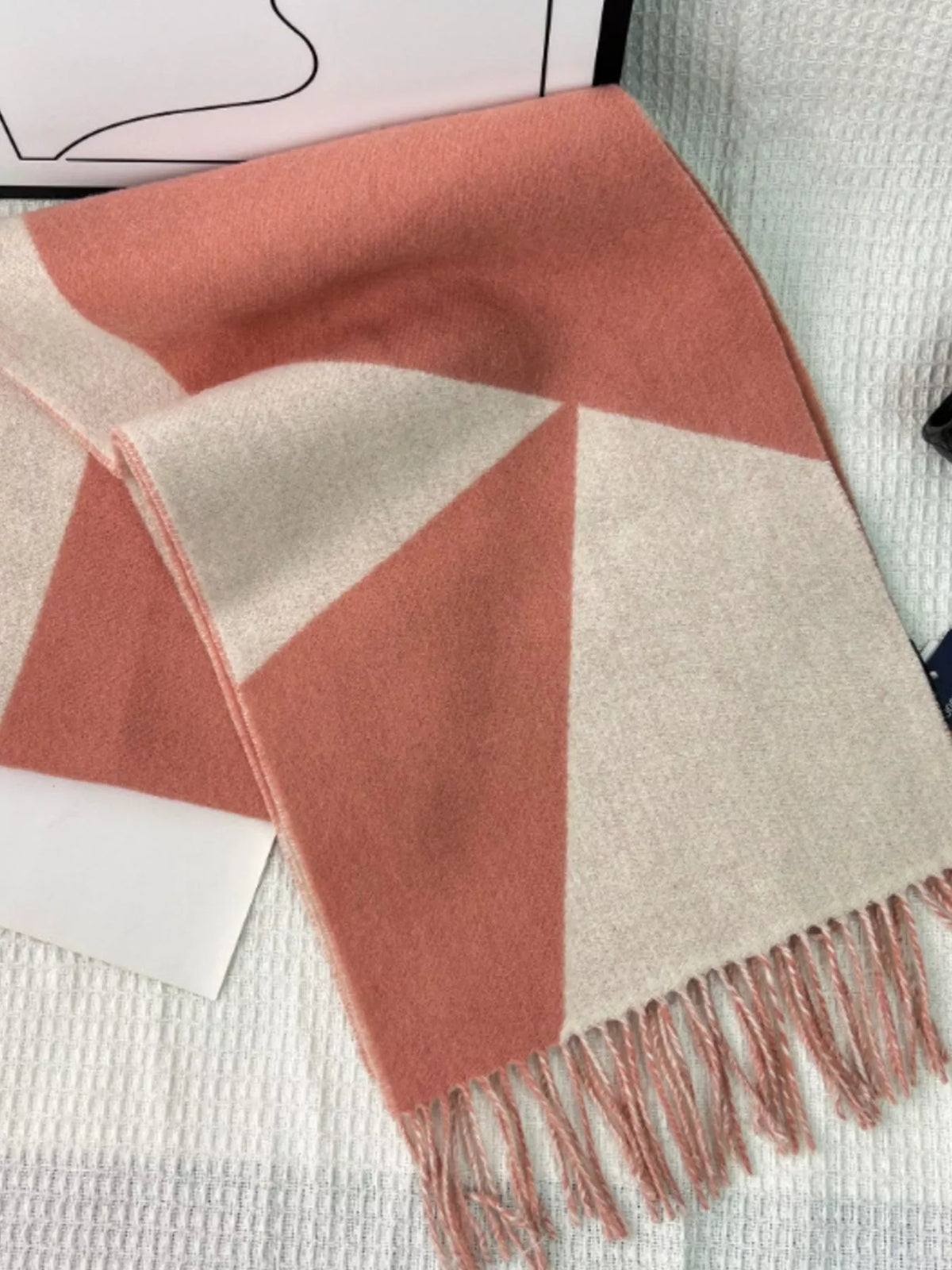 Color block scarf styled over a winter coat