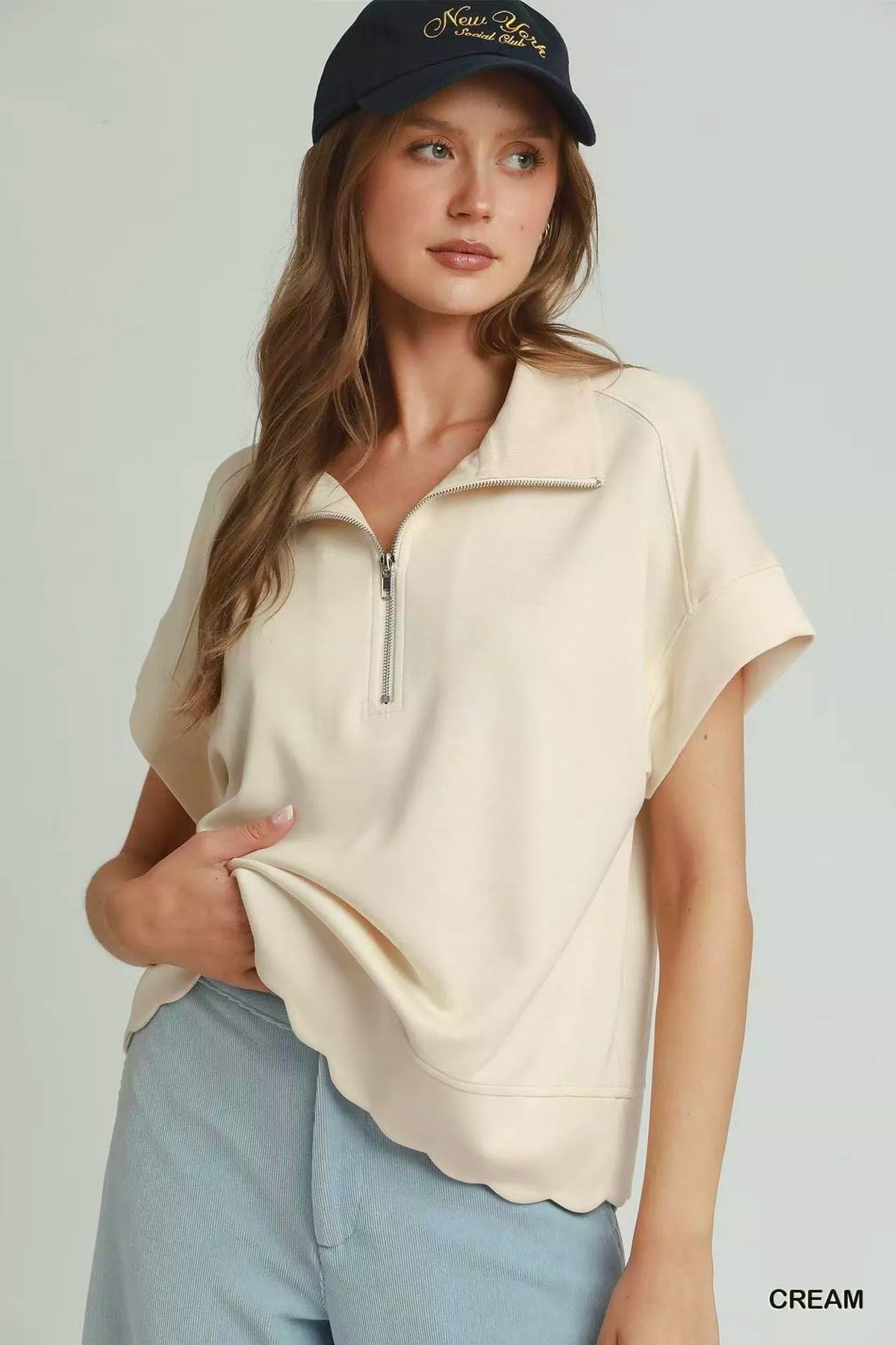 Cream Umgee half zip scalloped hem pullover front view