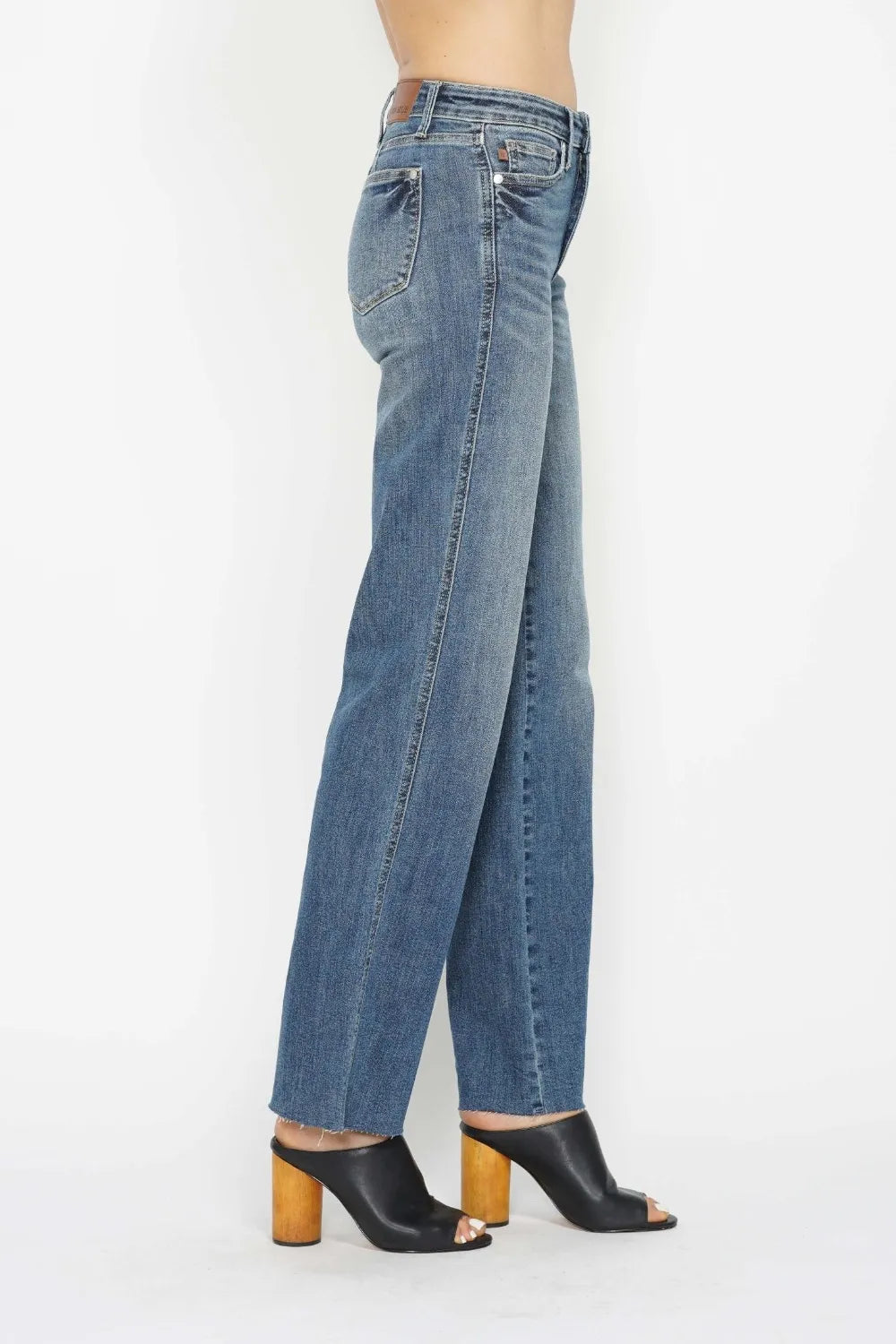 Straight leg jeans styled with a tucked in tee