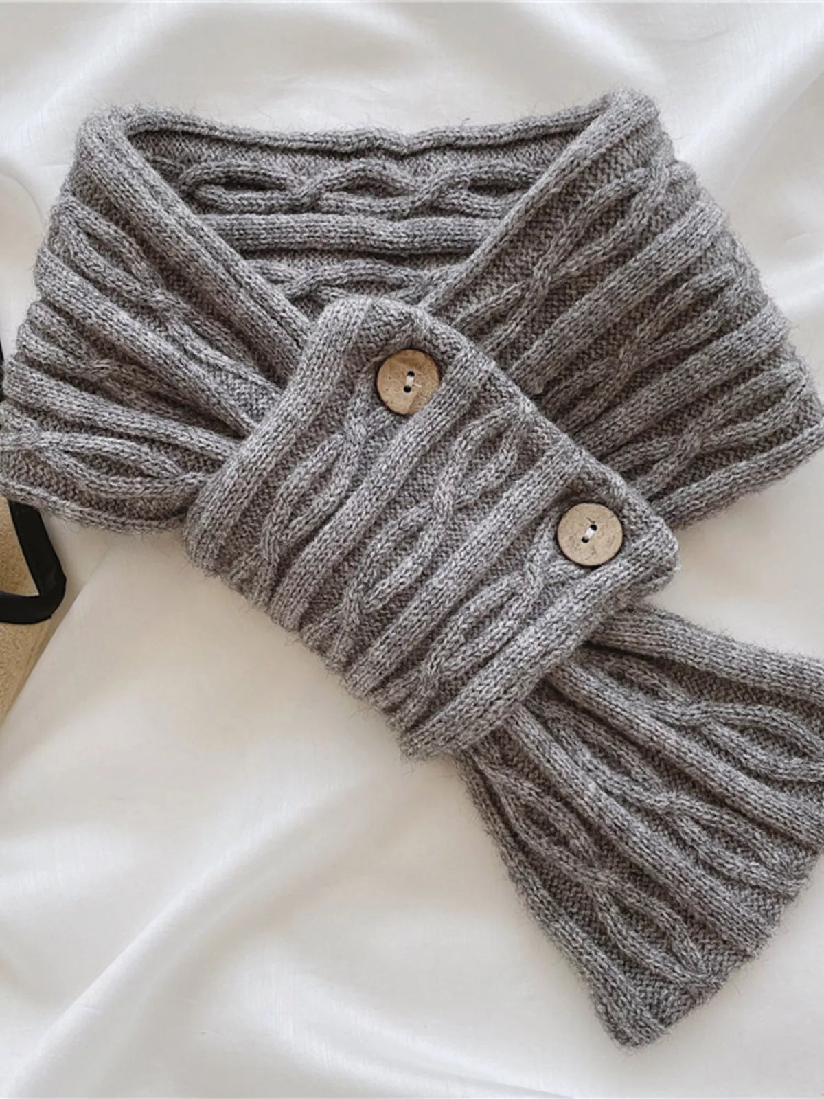 Button accent winter scarf shown wrapped
