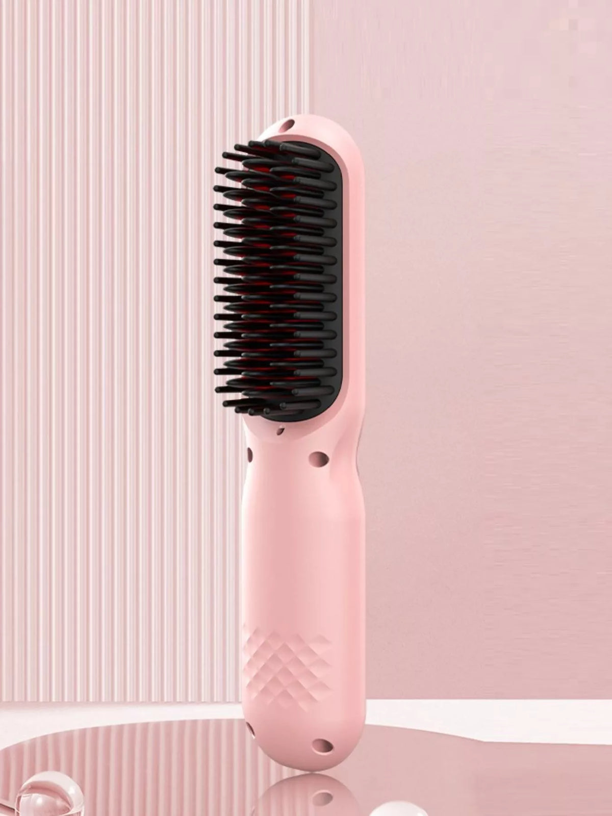 Straightening comb heated bristles close up