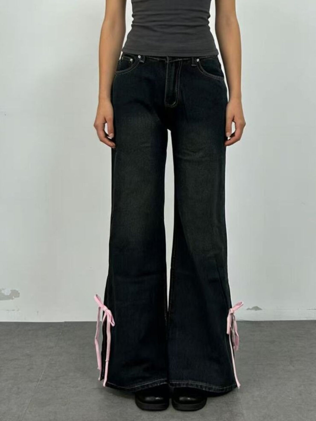 Flared leg hem on dark jeans