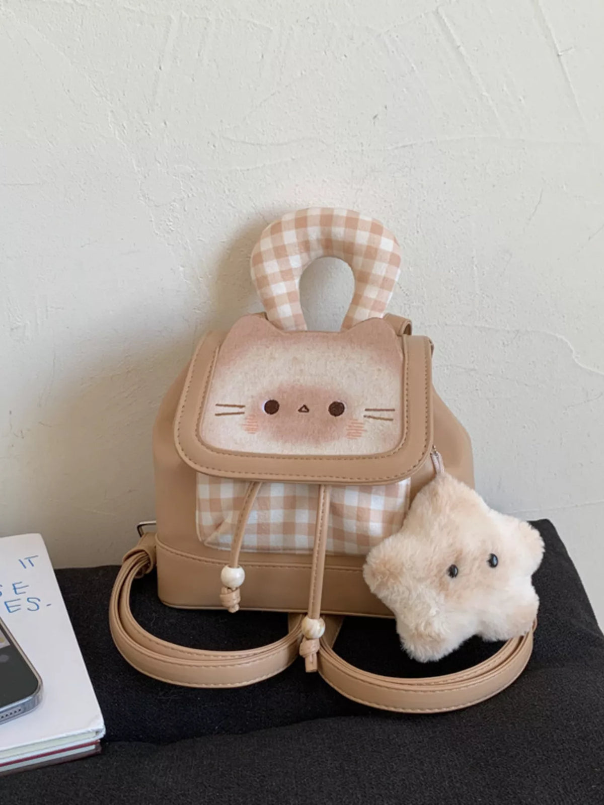 Tan mini backpack back panel