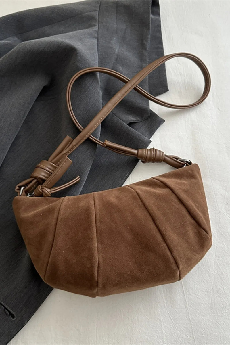 Suede croissant shoulder bag in brown front view