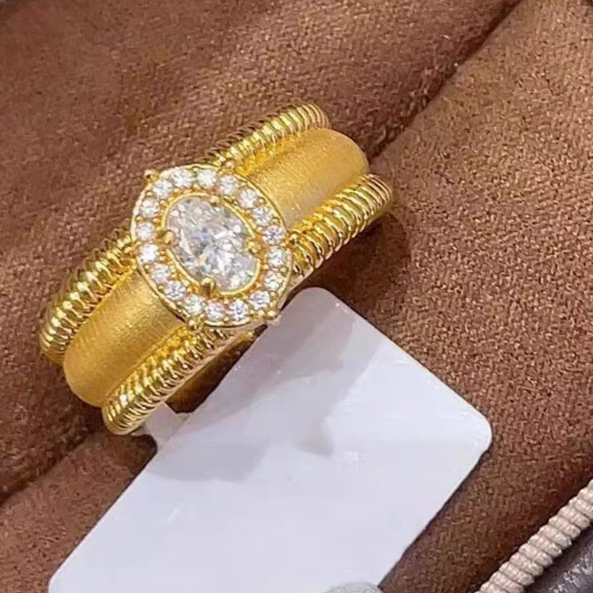 Gold plated zircon ring top down view