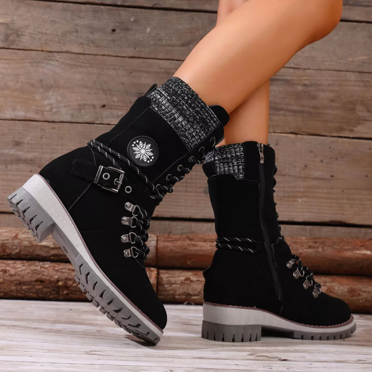 Lace up combat ankle boots styled with jeans