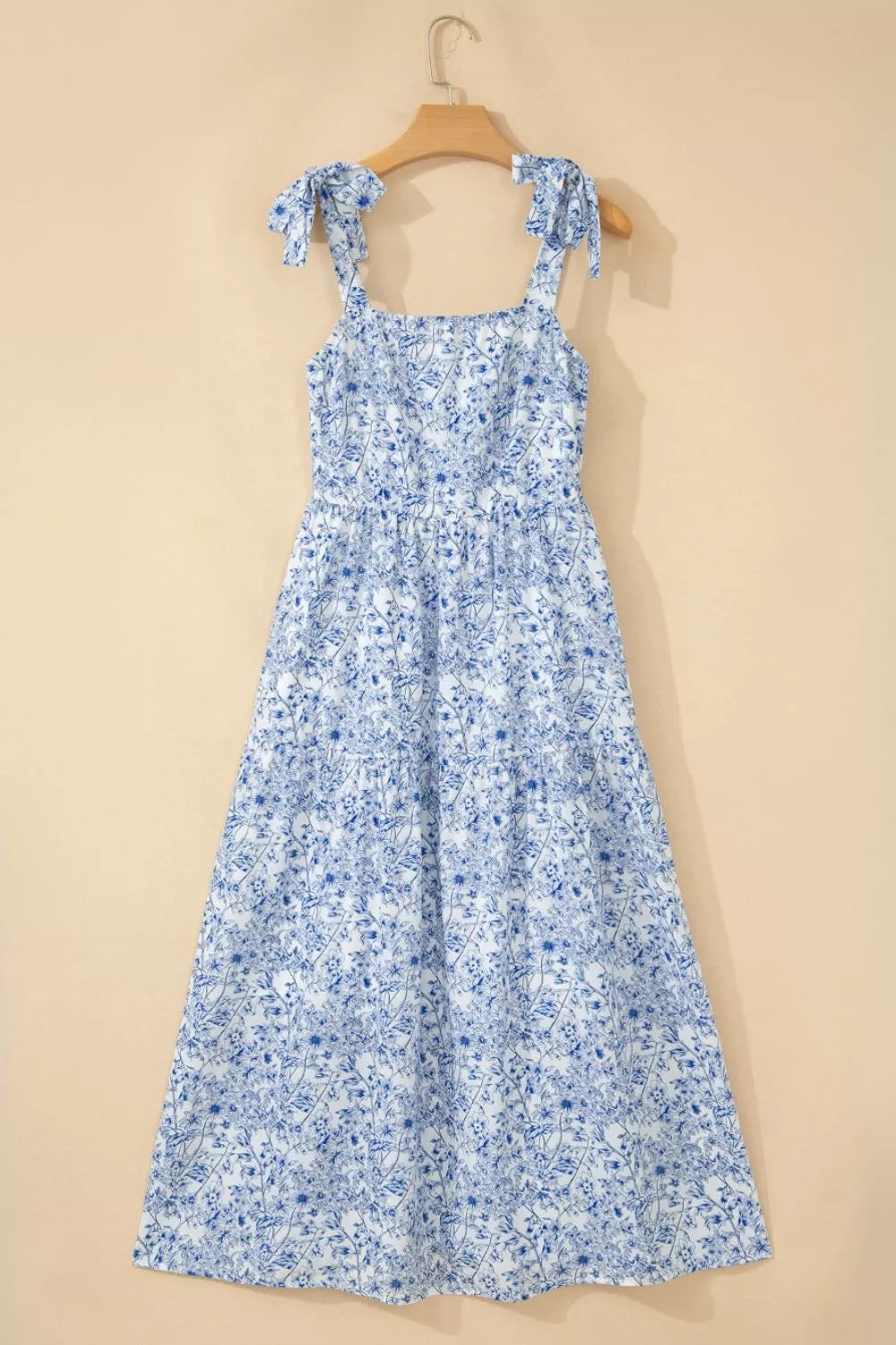 Light blue floral knot strap high waist flared maxi dress front view