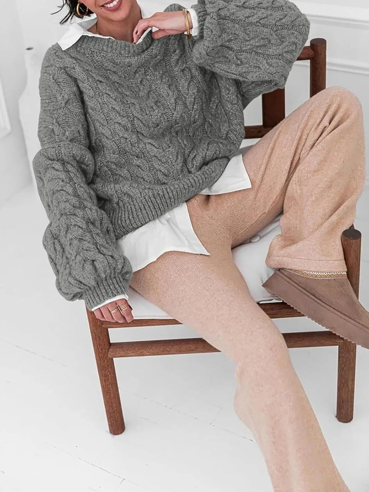 cable knit long sleeve sweater sleeve and cuff detail
