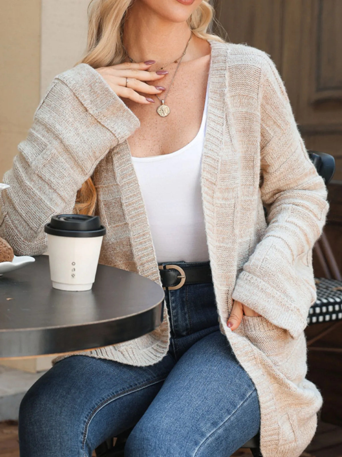 textured knit open front cardigan with pockets folded flat