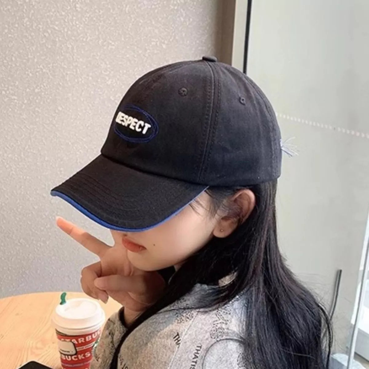 Baseball cap showing embroidered front detail