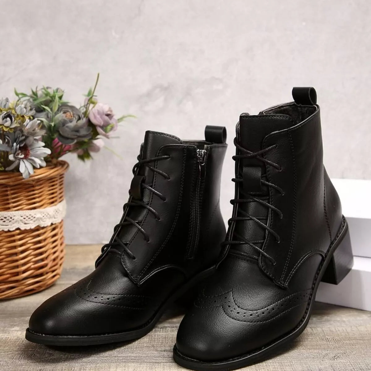 Lace up ankle boots with zipper sole and tread