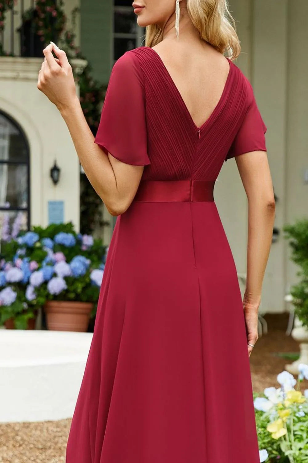 surplice flutter sleeve maxi dress neckline detail