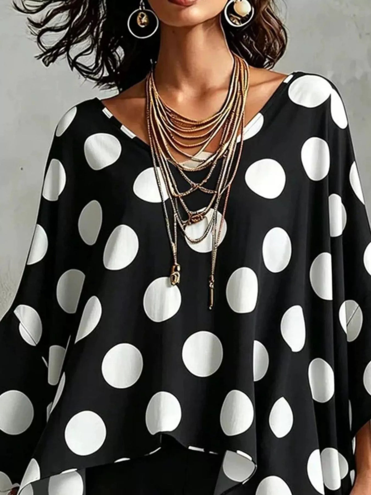 Full styling view of the womens polka dot blouse