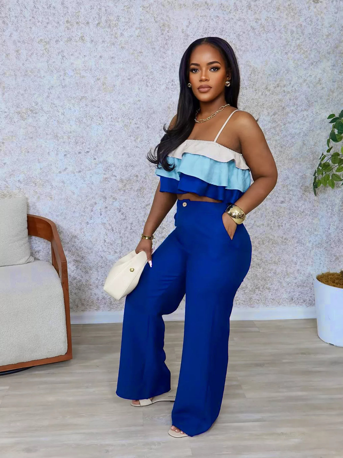 Layered ruffle detail on blue crop top