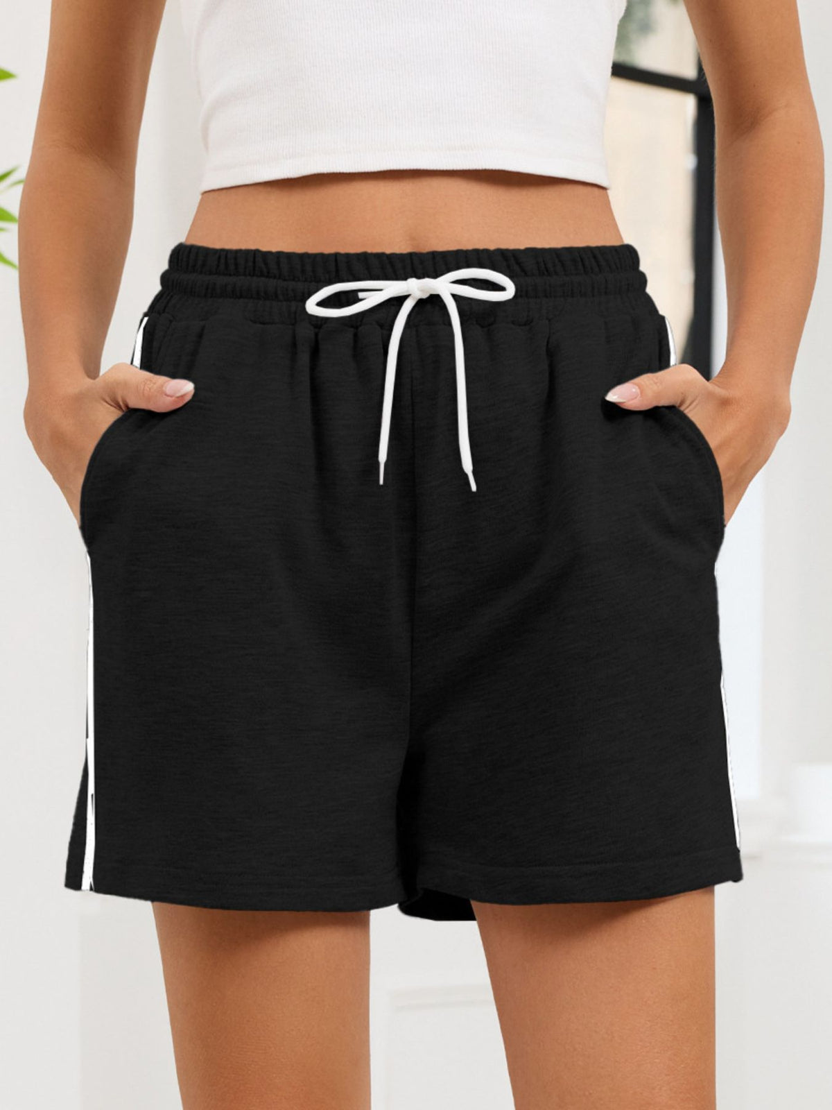 Drawstring shorts shown in an alternate colorway