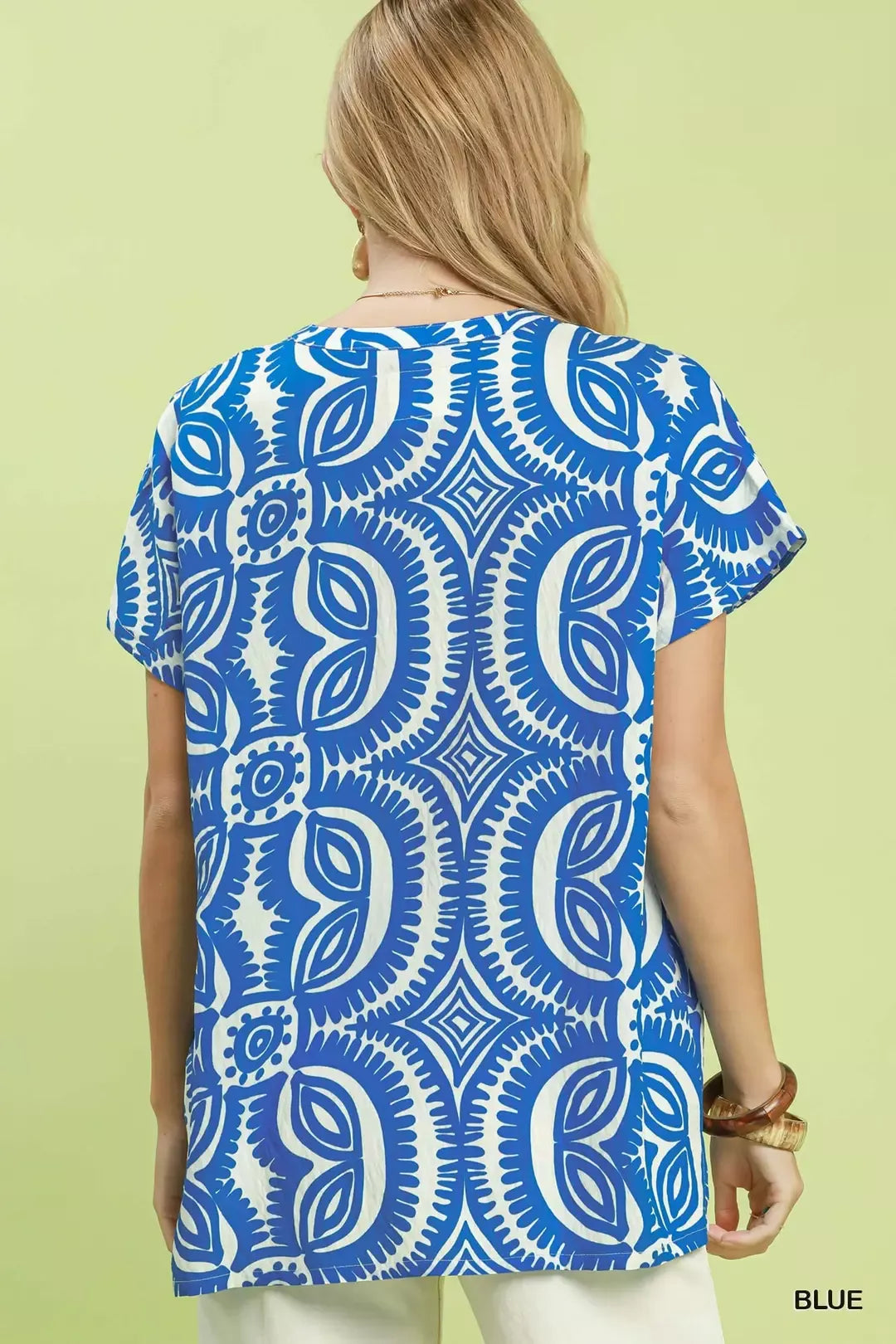 umgee blue geometric print v neck top side view