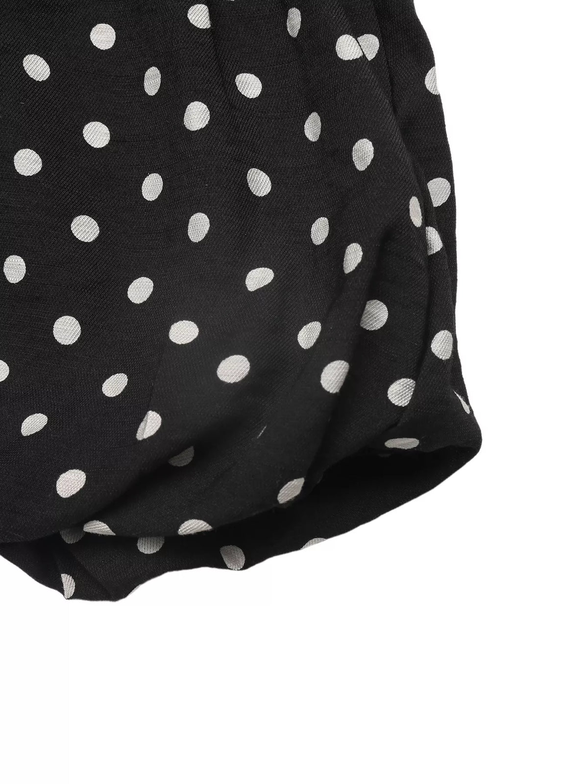 Black polka dot spaghetti strap ruffle hem dress front view