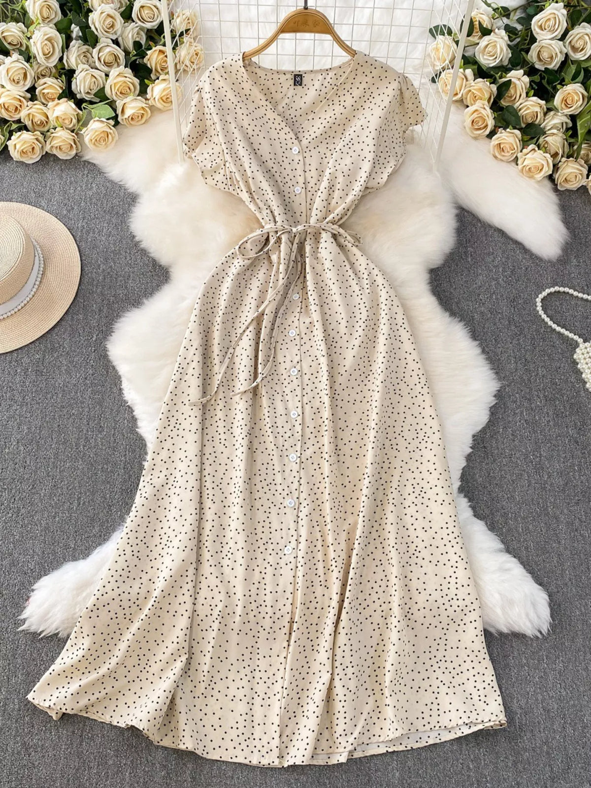 Apricot polka dot button up belted maxi dress front view