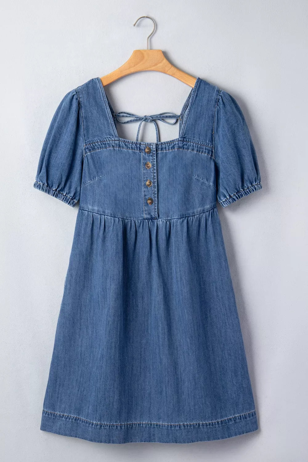 Medium wash button front puff sleeve denim dress, detail view
