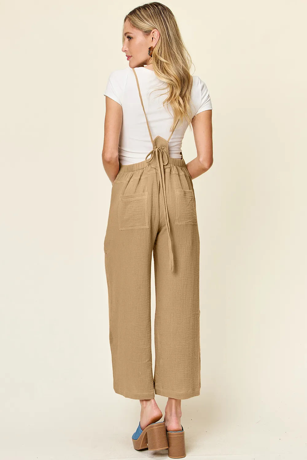 Styled view of the sleeveless wide leg overall