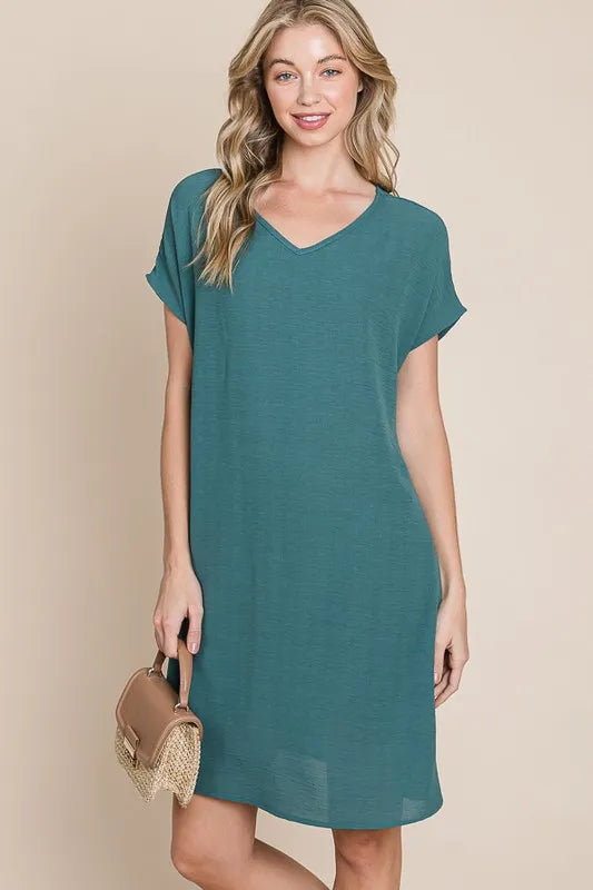 V Neck Short Sleeve Dress with Pockets in Teal back view