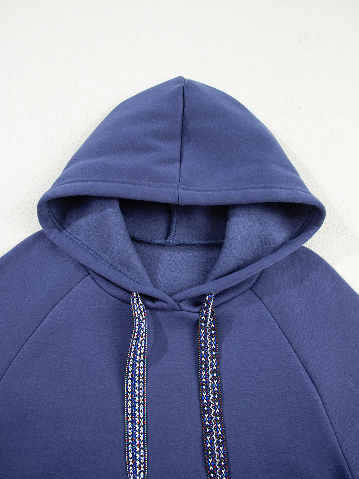 Side view of navy longline tunic hoodie