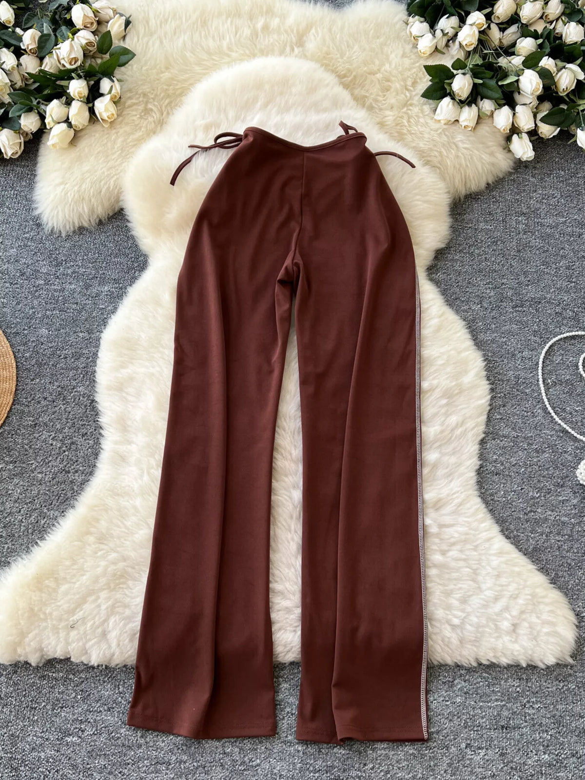 Dark brown wide leg tie waist pants, back view