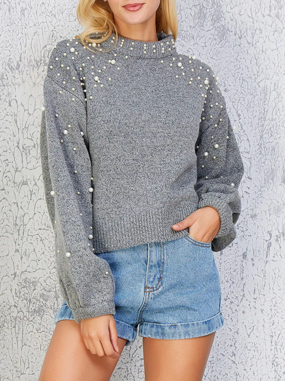 Gray mock neck sweater styled with denim