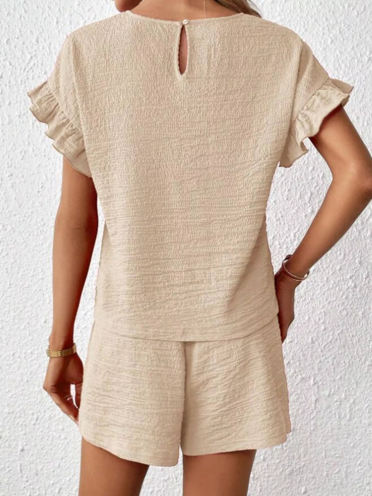 Coordinated tan tee and shorts set side view