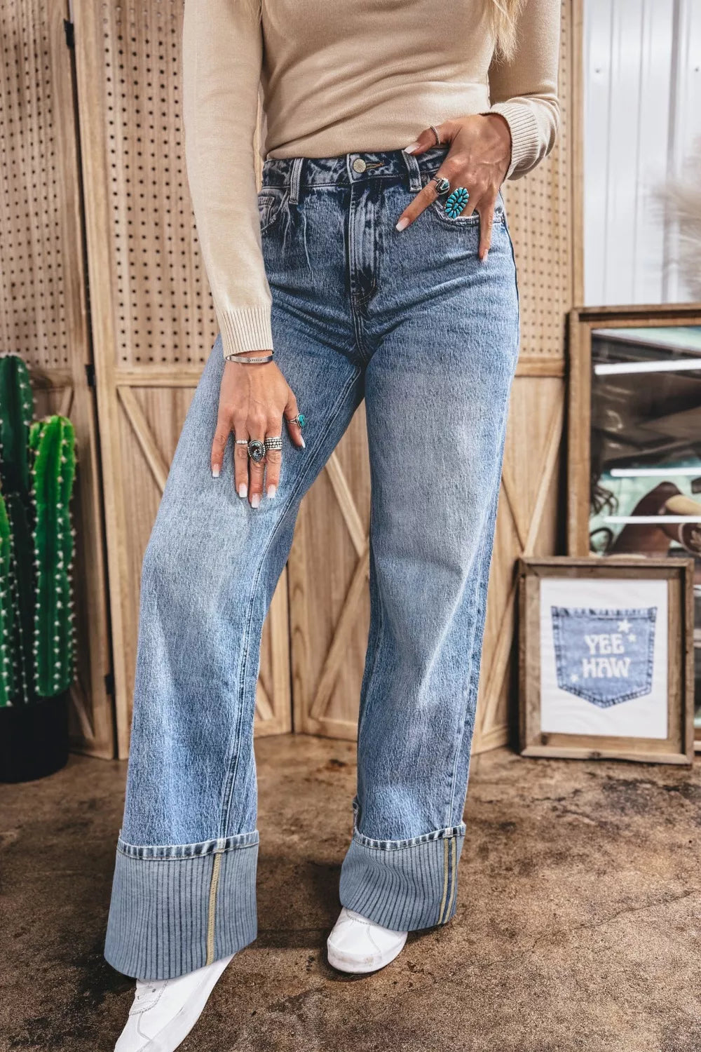 Back view of straight leg loose jeans in medium wash