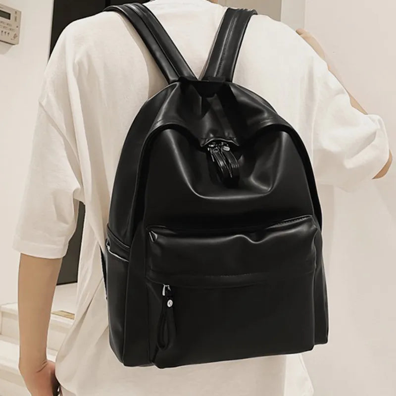 Faux leather zip backpack top handle close up