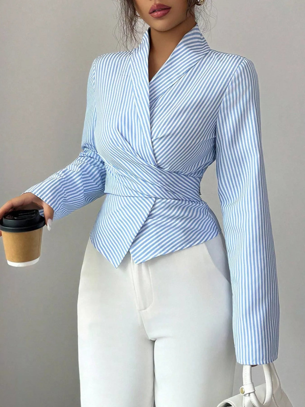 Close view of the fine stripe fabric and long sleeve cuff