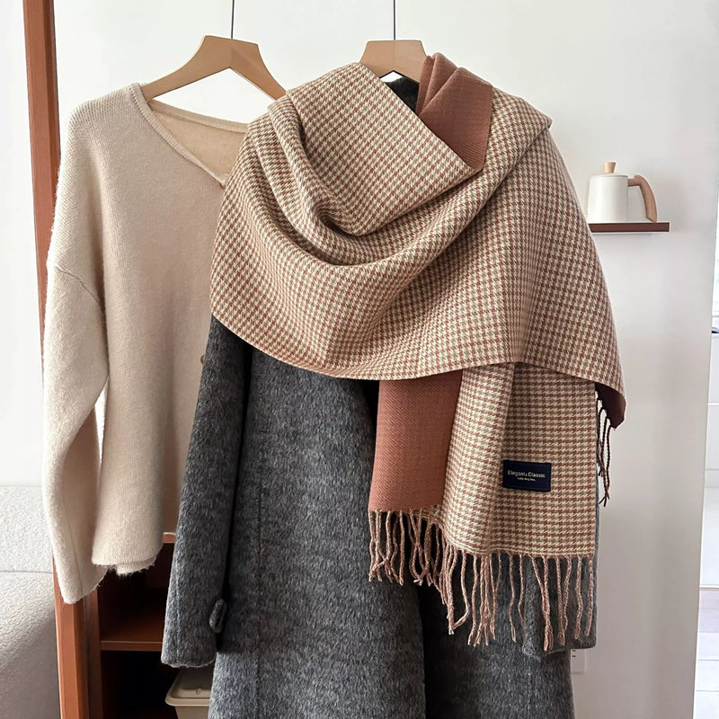 Plaid fringe warm winter scarf shown draped around the neck