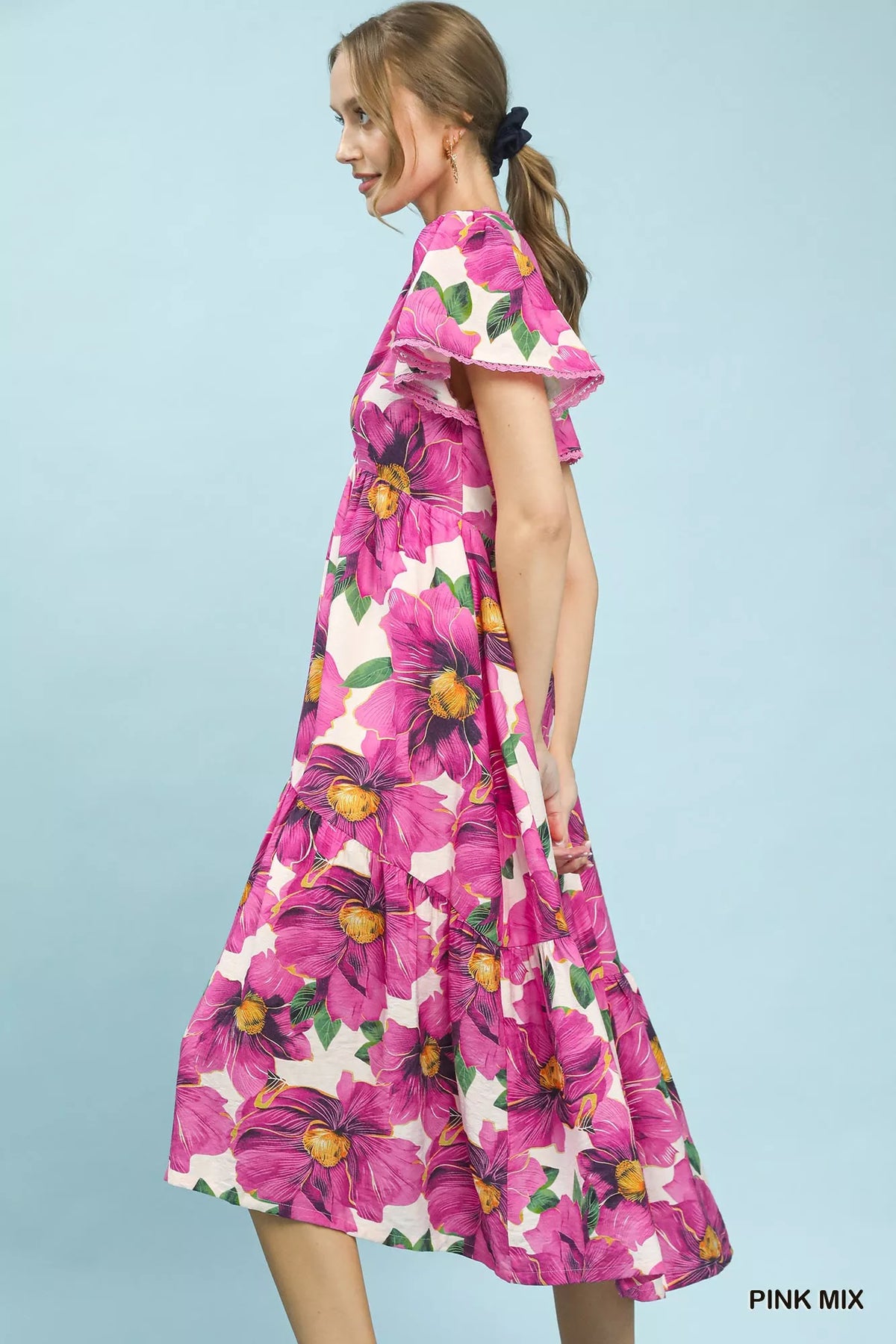 Pink tropical floral v neck flutter sleeve tiered midi dress side view