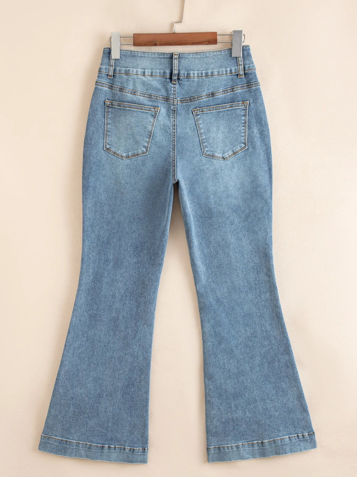 Back view of seam detail flare jeans
