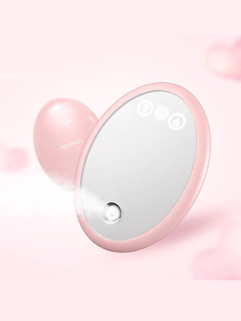 Portable facial steamer beauty device in blush pink