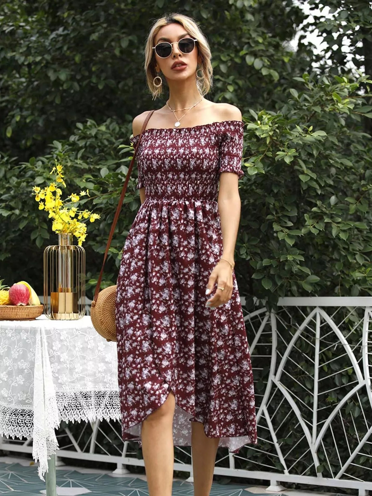 Neckline and shoulder detail of the frill trimmed dress