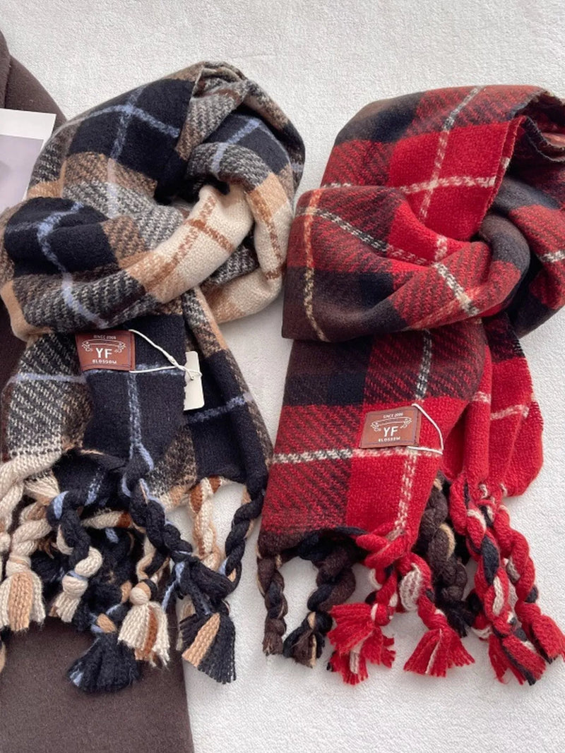 Warm plaid tassel scarf shown draped around the neck