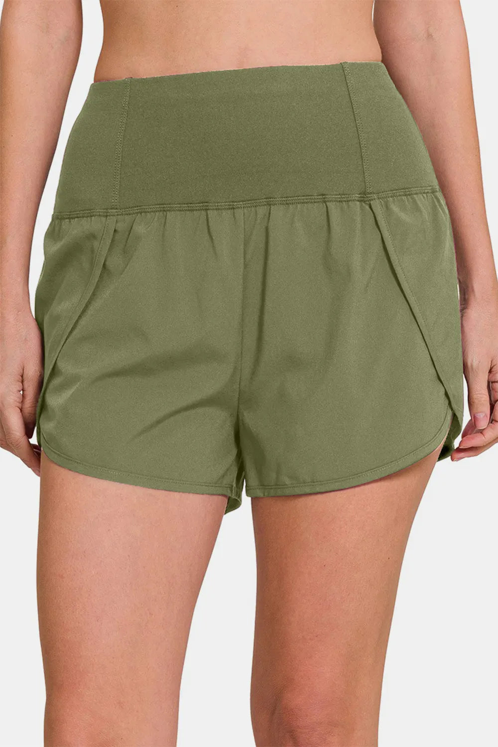 light olive Zenana high waist zip pocket active shorts styled on model