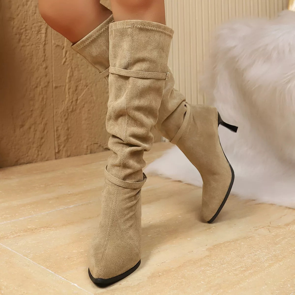 Point toe kitten heel boots sole and tread