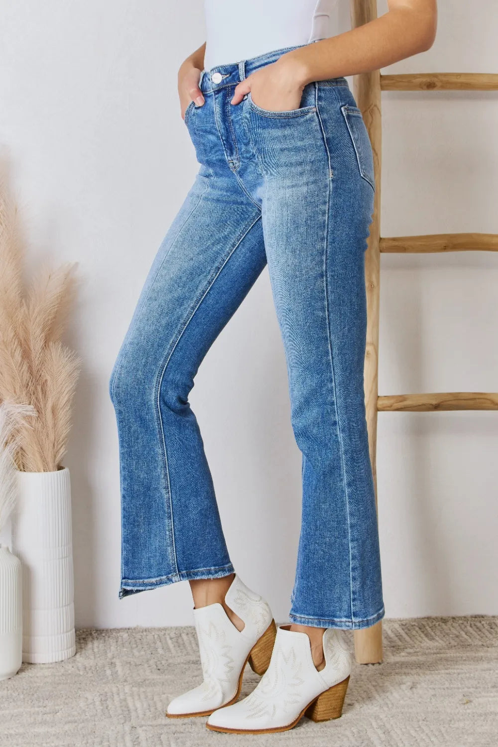 High rise ankle flare jeans flared hem detail