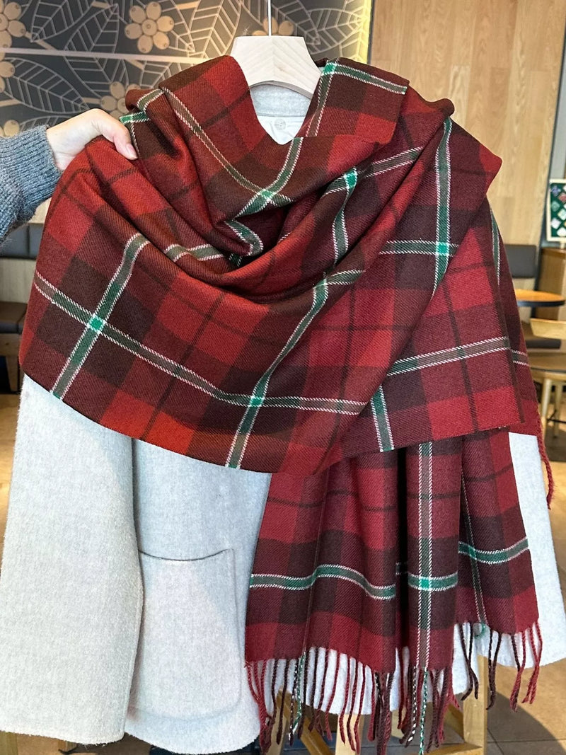 Classic plaid fringe scarf draped over a coat