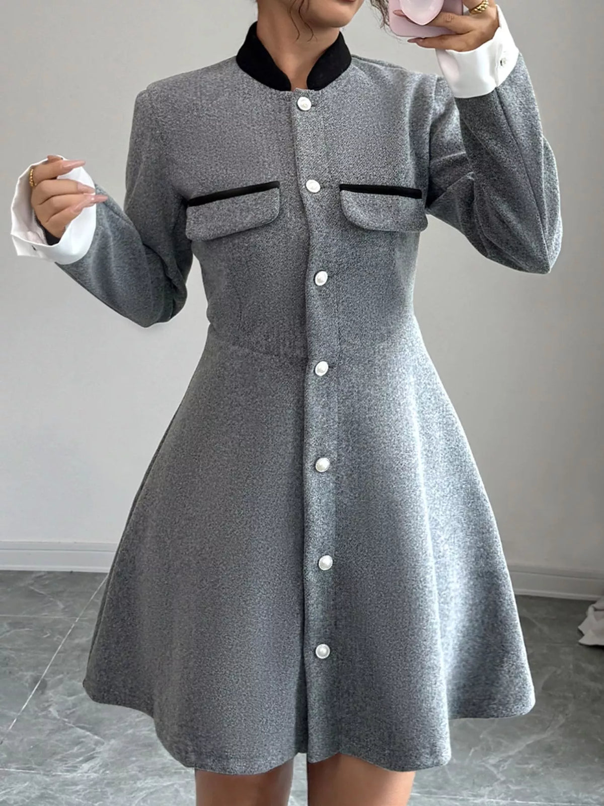 a line long sleeve button down dress in gray front view