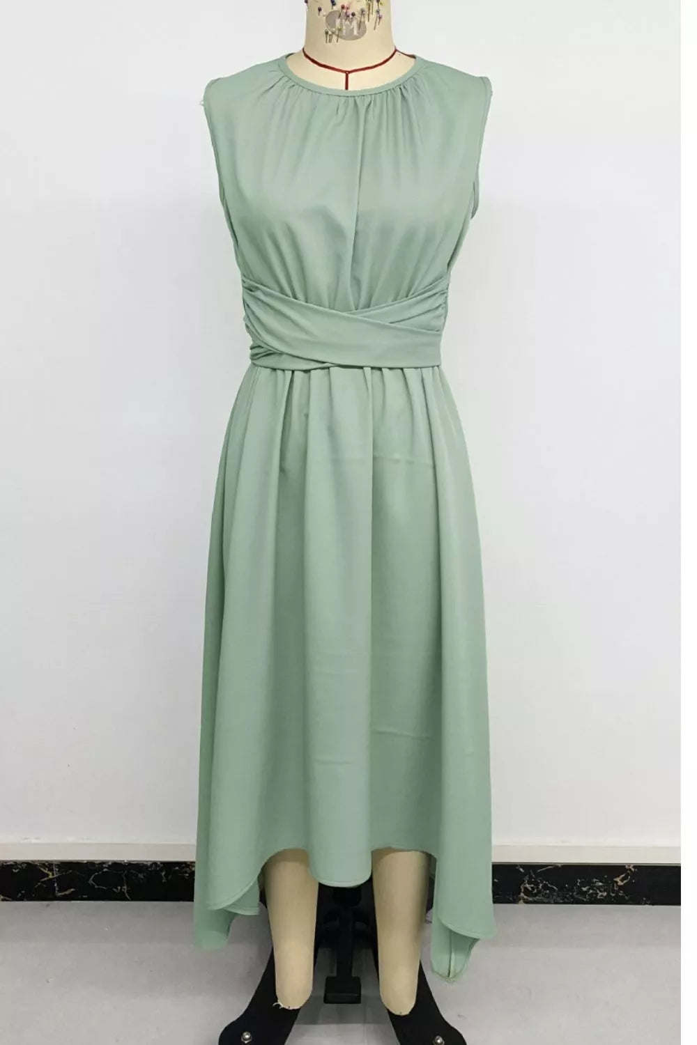 Sage green A line dress three quarter view