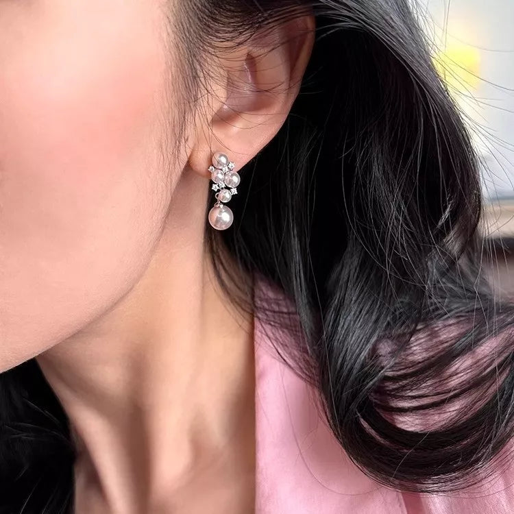 Pearl cluster earrings detail view