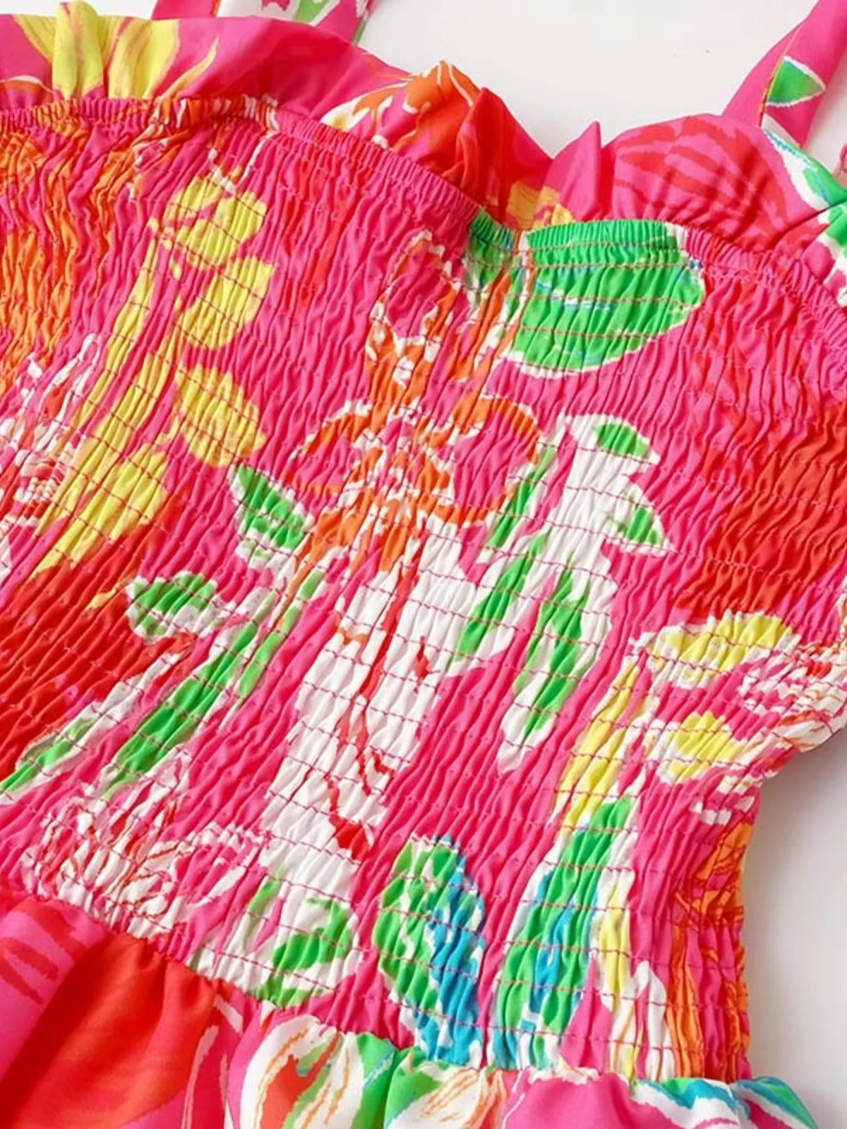 Tropical print smocked tie strap dress front view