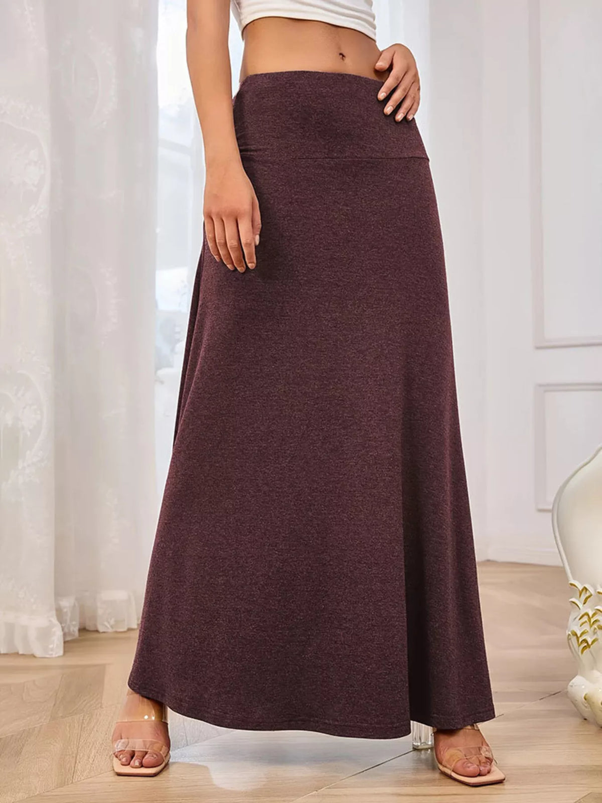 Flowy long skirt in a deeper shade shown from the front