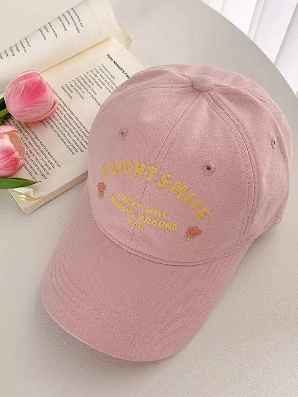 Close up of the embroidery detail on the cap front panel