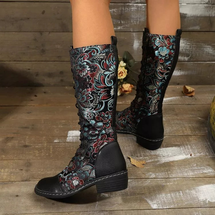 Embroidered knee high boots heel detail