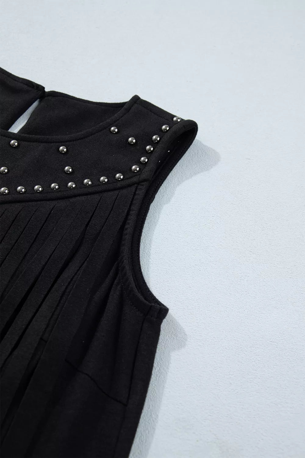 Black fringe top shown flat
